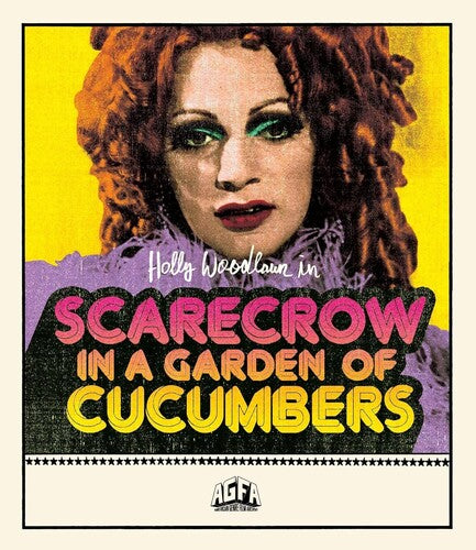 Scarecrow In A Garden Of Cucumbers